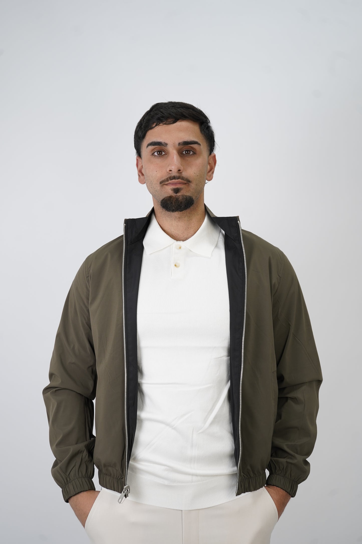 SCHWARZ / GRÜNE WENDEJACKE