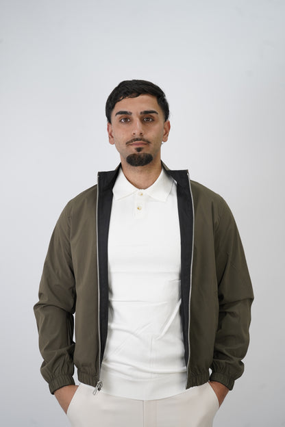 SCHWARZ / GRÜNE WENDEJACKE