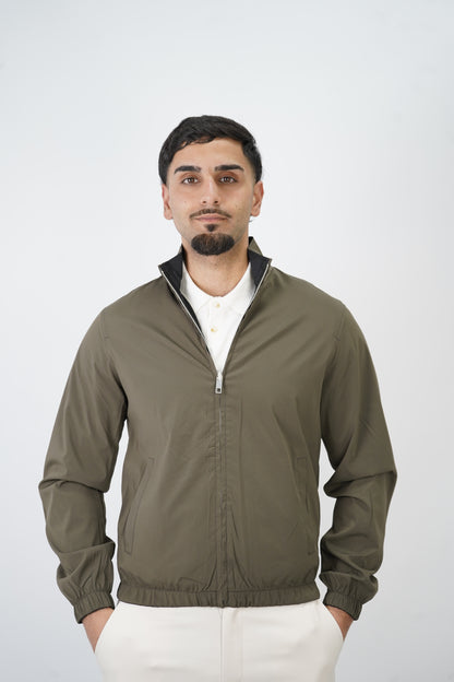 SCHWARZ / GRÜNE WENDEJACKE