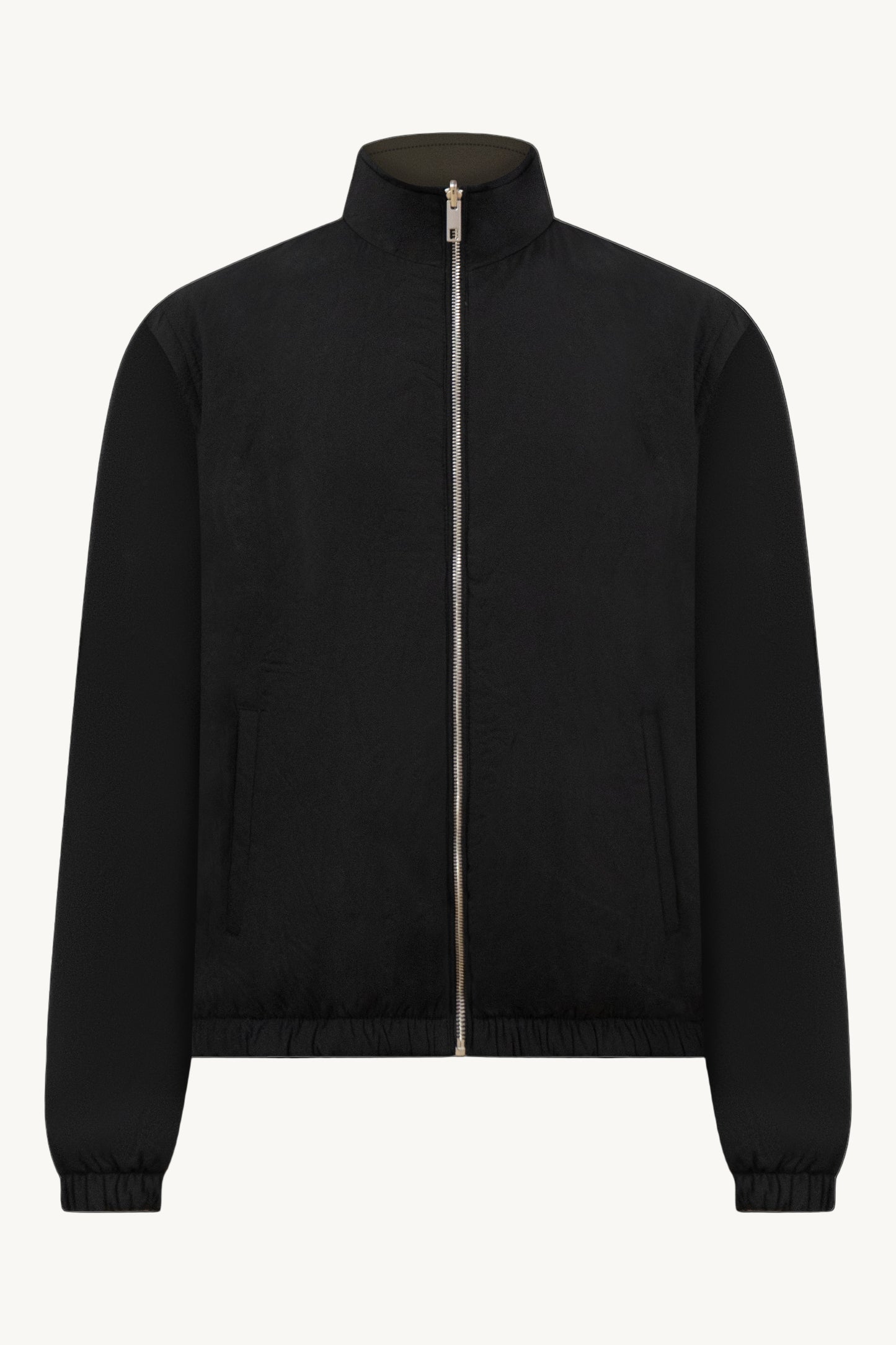 SCHWARZ / GRÜNE WENDEJACKE