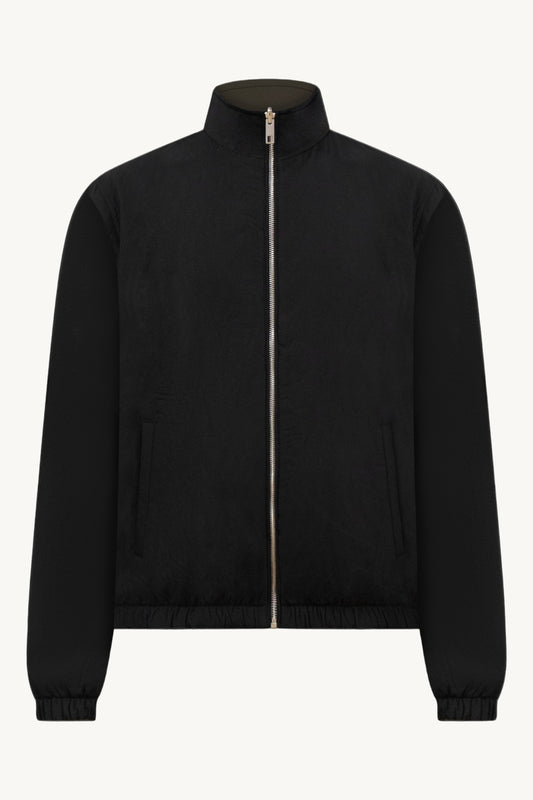 SCHWARZ / GRÜNE WENDEJACKE