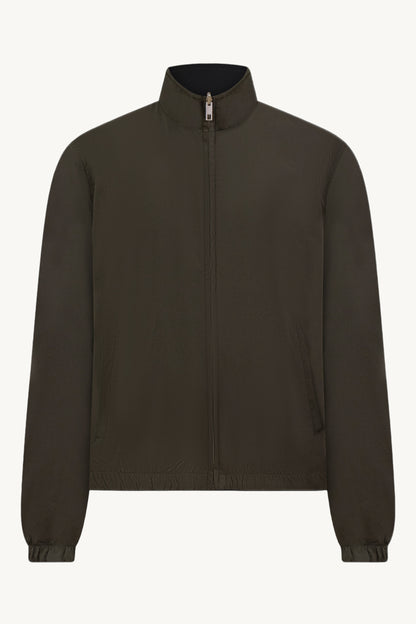 SCHWARZ / GRÜNE WENDEJACKE