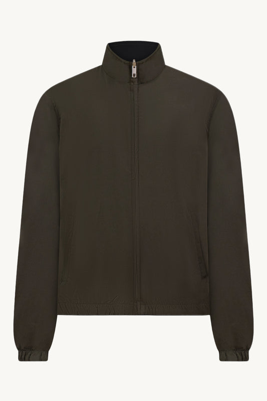 SCHWARZ / GRÜNE WENDEJACKE